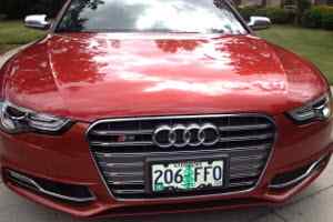 A red Audi owned by a Medical telephone answering service owner