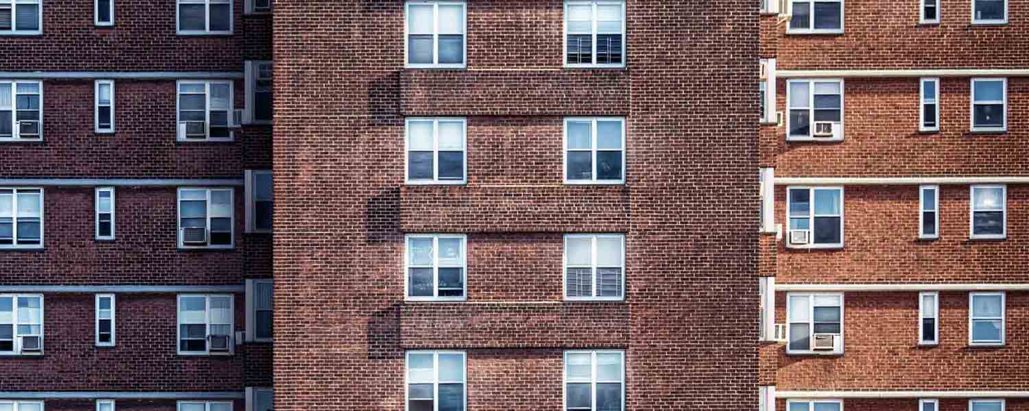 A building managed by a property management company that benefits from an answering service