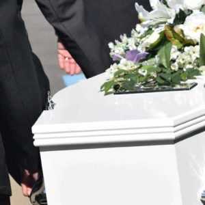 A casket carried by a funeral home business customer of Centratel Telephone Answering Service