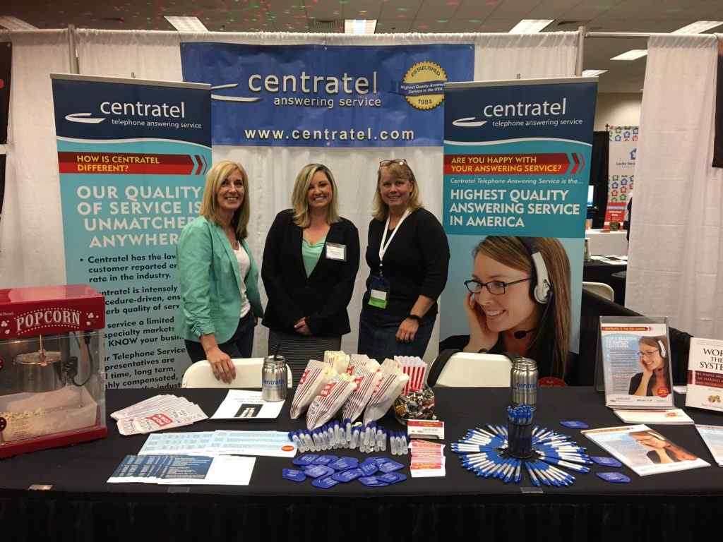 Centratel Telephone Answering Service Staff smiling at a Home Health Care Trade Show