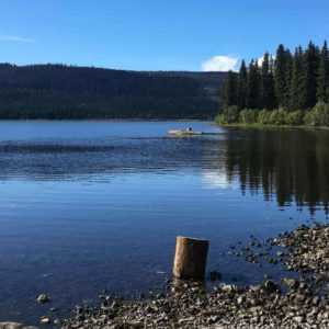 A peaceful lake reminds that Labor day can be peaceful too with an answering service phone coverage