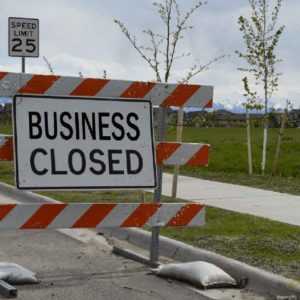 A Business Closed sign as a consequence of a disaster an answering service can help with