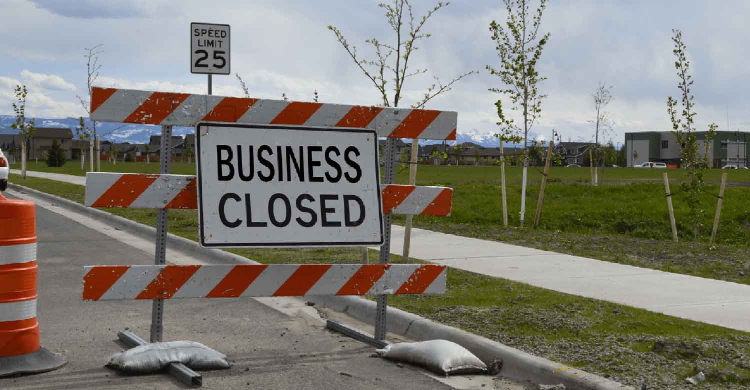 A Business Closed sign as a consequence of a disaster an answering service can help with
