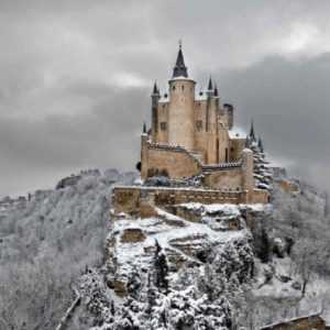 A castle in the snow featuring the busiest season for a property management answering service