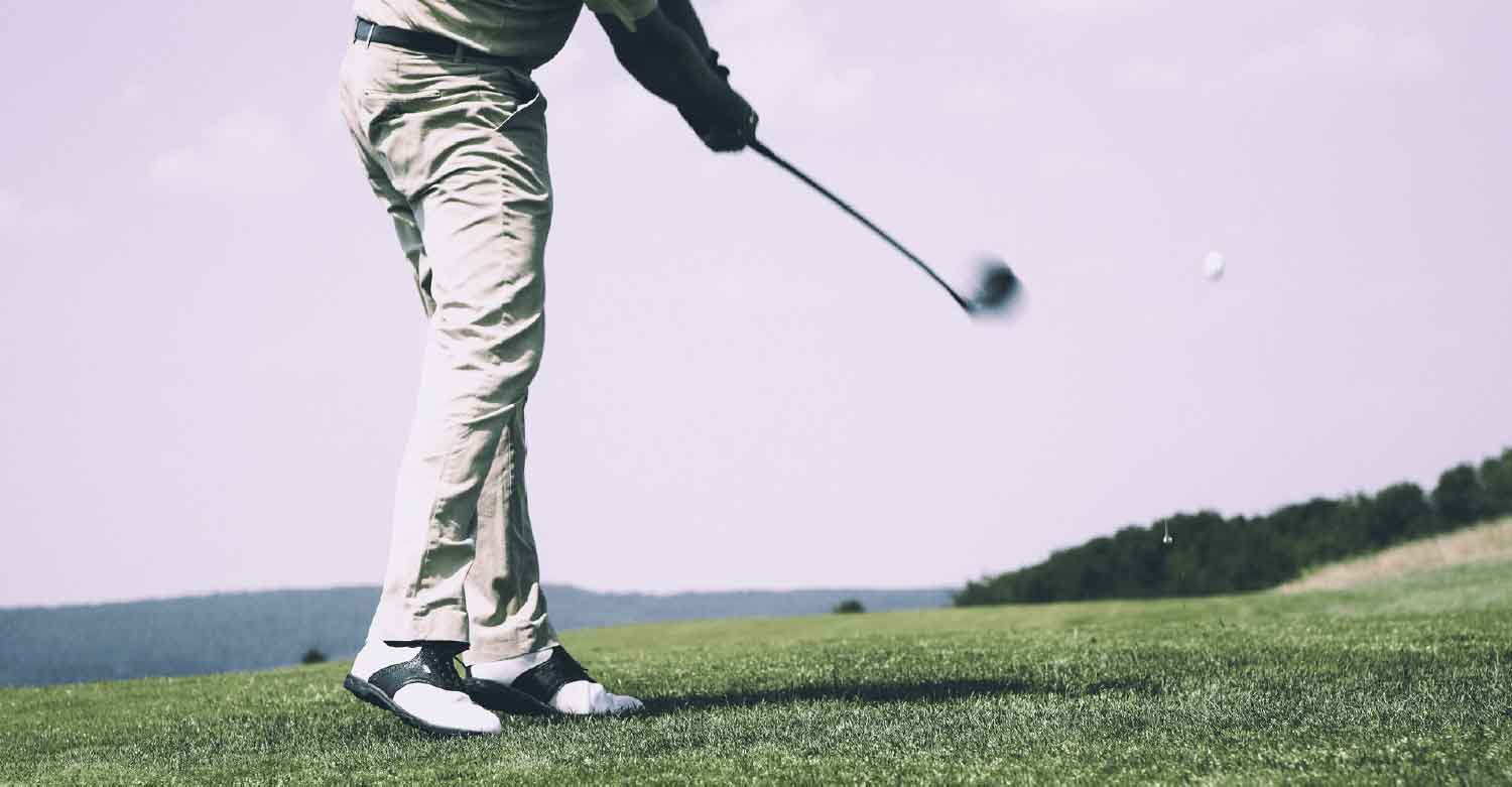 Golf player hits a ball the same way you can drive your business forward hiring an answering service