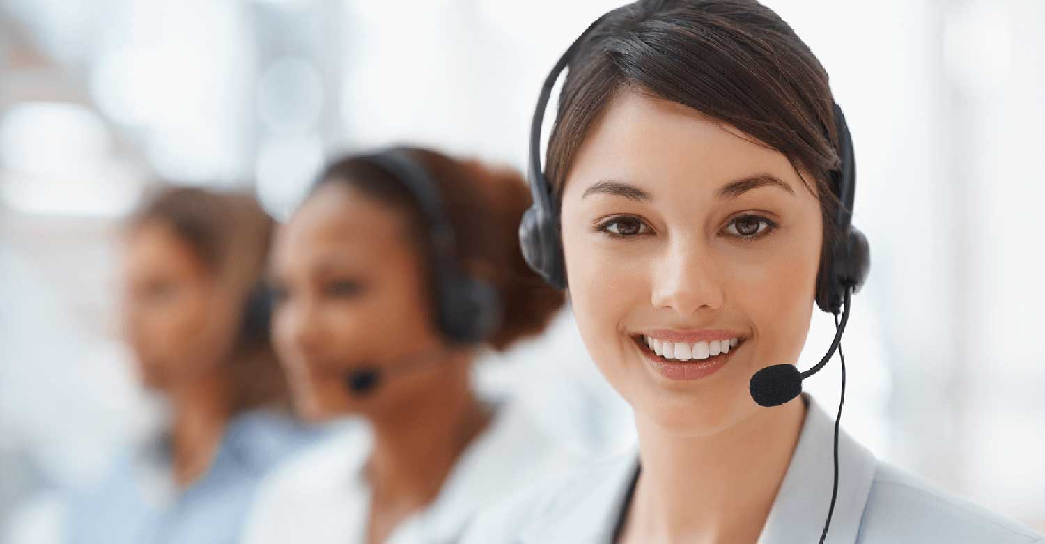 Centratel's Home Health Care telephone answering service representative smiling while taking calls