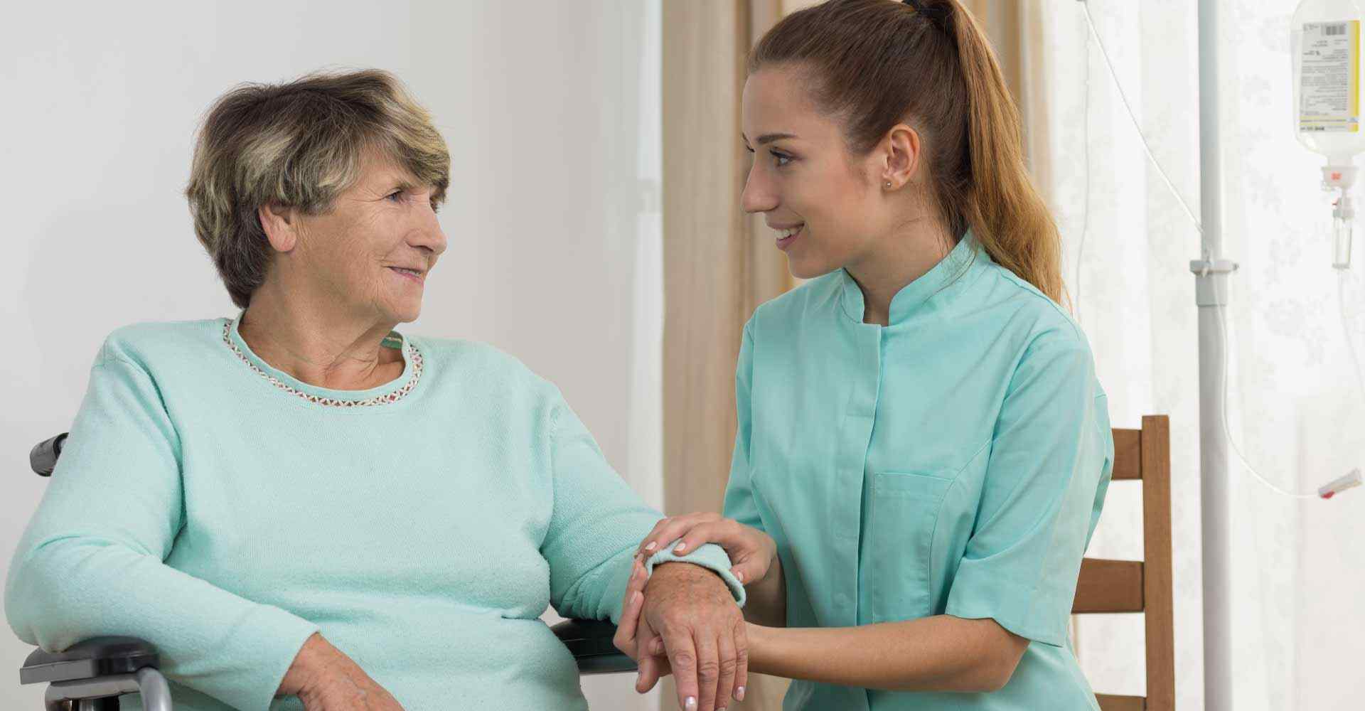 Home nurse with an old woman representing Home HealthCare Workforce served by an answering service