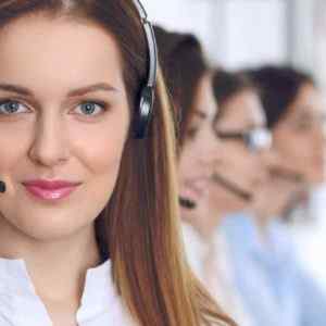 A female telephone answering service operator helping HVAC companies in taking phone calls