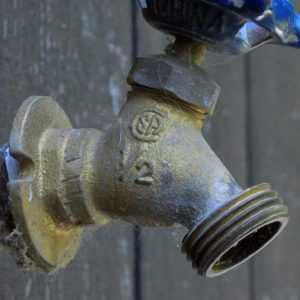 A pipe fixed with the help of a disaster restoration company and its answering service