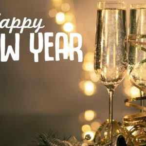 Two glasses of sparkling wine and a Happy New Year wish from Centratel