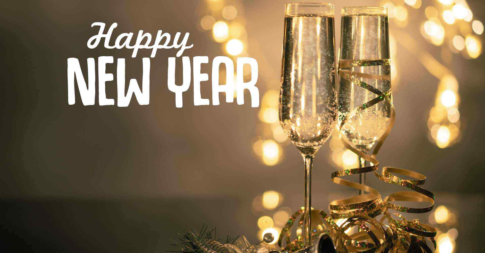 Two glasses of sparkling wine and a Happy New Year wish from Centratel