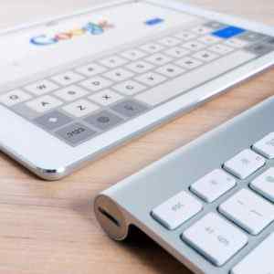 Tablet and keyboard useful for SEO, along with your disaster restoration answering service