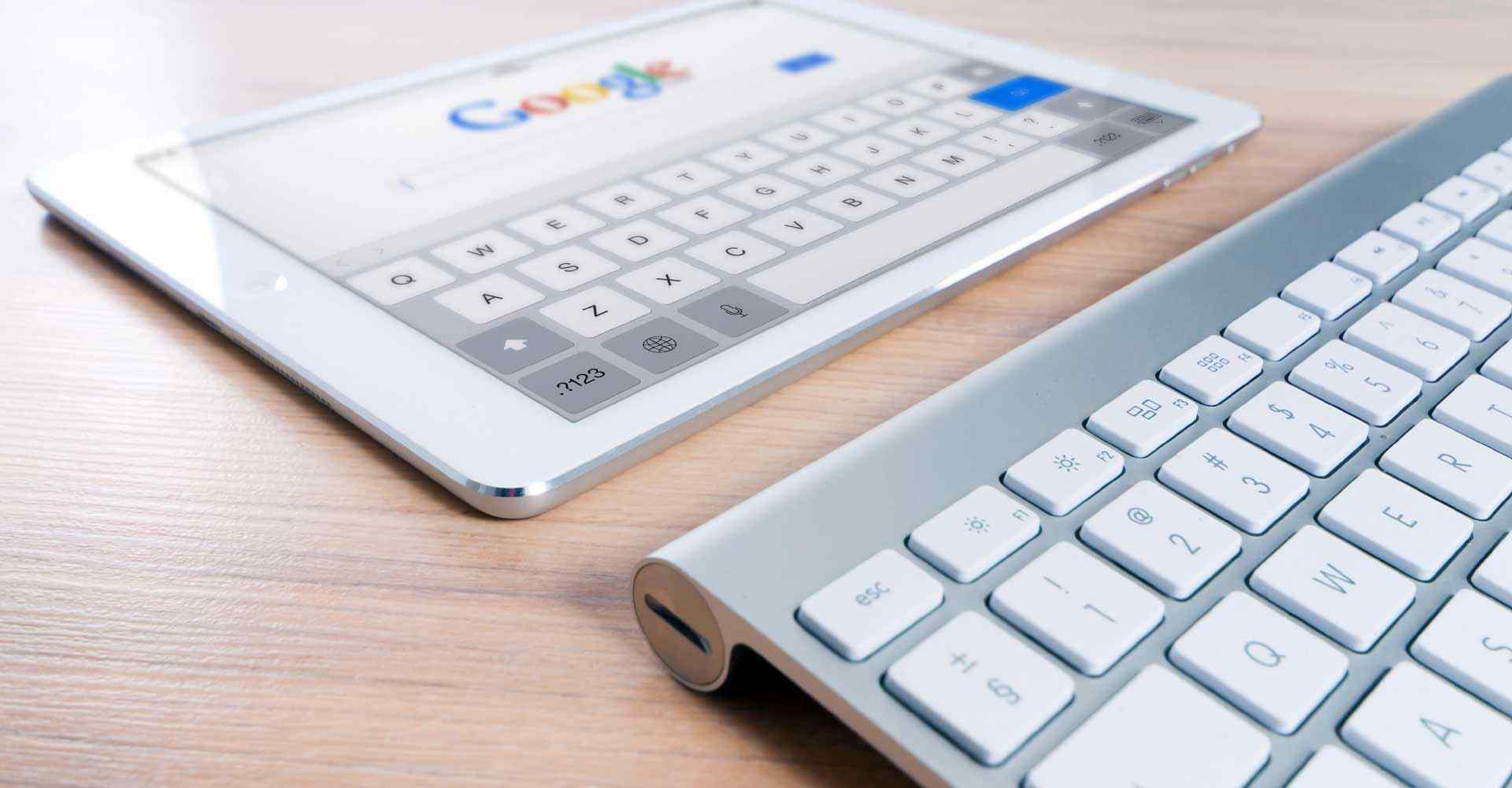 Tablet and keyboard useful for SEO, along with your disaster restoration answering service