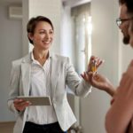 A property management business owner helping her customers finding the right apartment