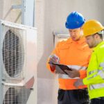 HVAC business owners working togheter on the field