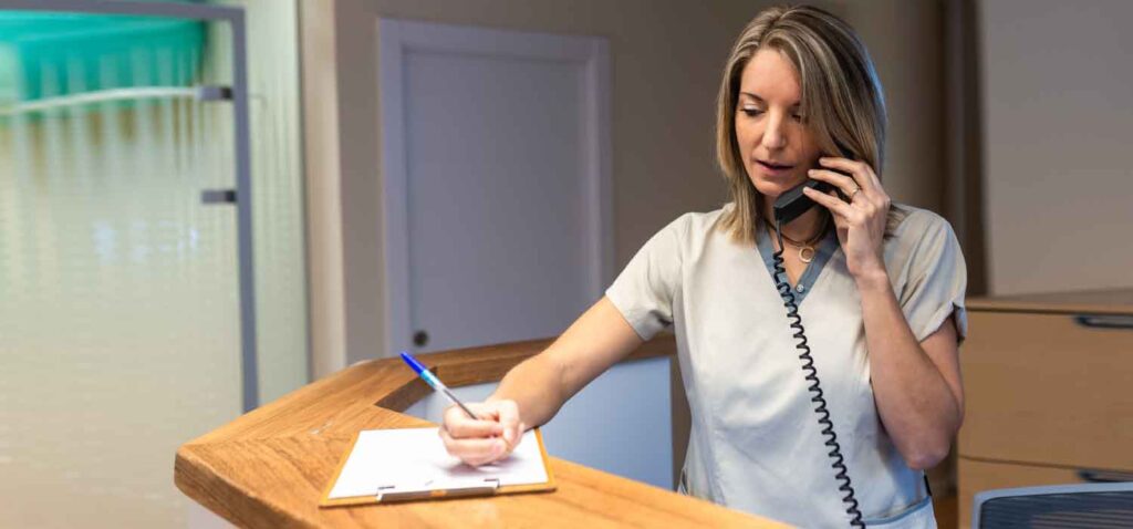 Nurse managing after-hours information with the home healthcare answering service