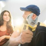 Plumbing business owner taking with the customer helped by a plumbing answering service